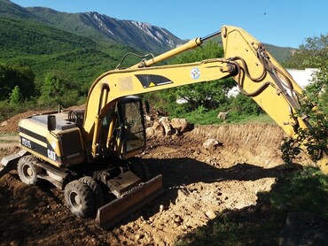 CAT M315