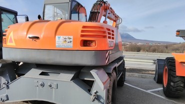 ЭКСМАШ E140W