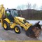 NEW HOLLAND В 110 + гидромолот