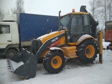 VOLVO BL-71, CASE 580 SR.